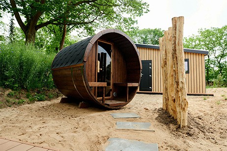 Zandlodge huisje met sauna in de tuin op de Veluwe - De IJsvogel