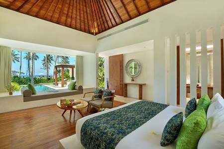Huwelijksreis Bali - Candi Beach Resort en Spa - Hotelkamer met zwembad